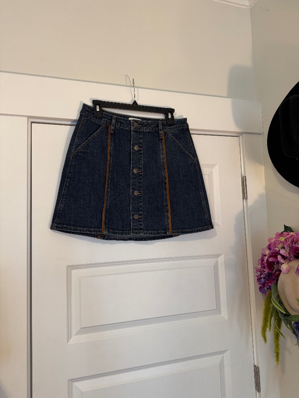 Dark denim skirt with leather trim. Size M